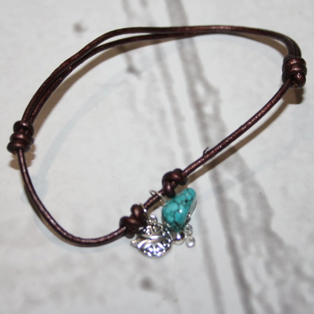 Cute faux leather bracelet with turquoise and ladybug charm adjustable